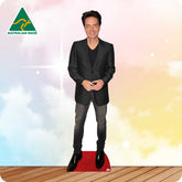 Cardboard cutout of a person in a suit with 'Australian Made' logo on a colorful background